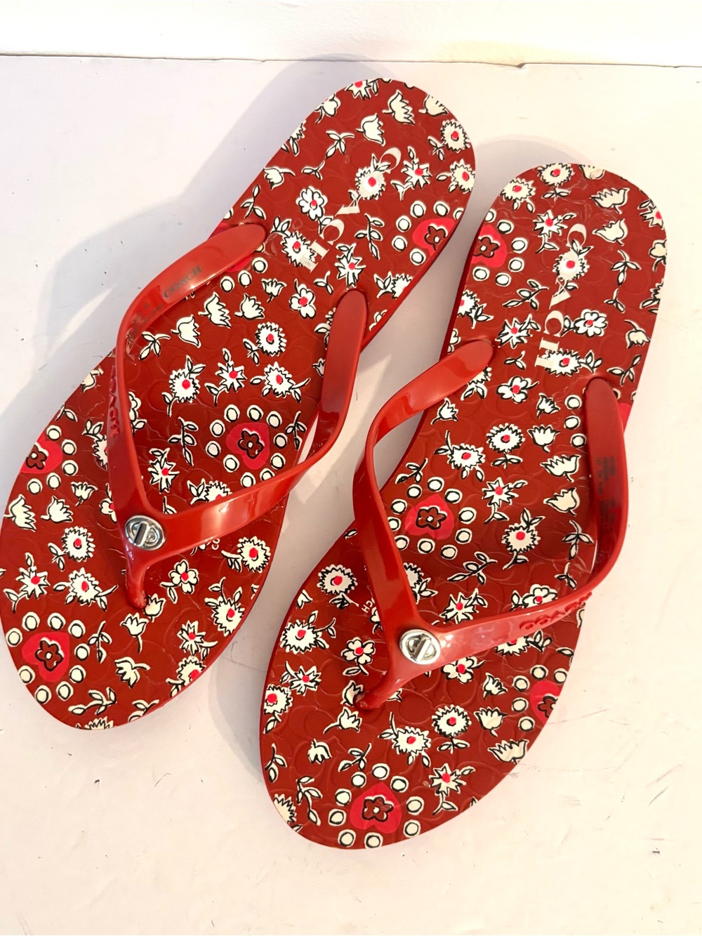 Coach flip flops